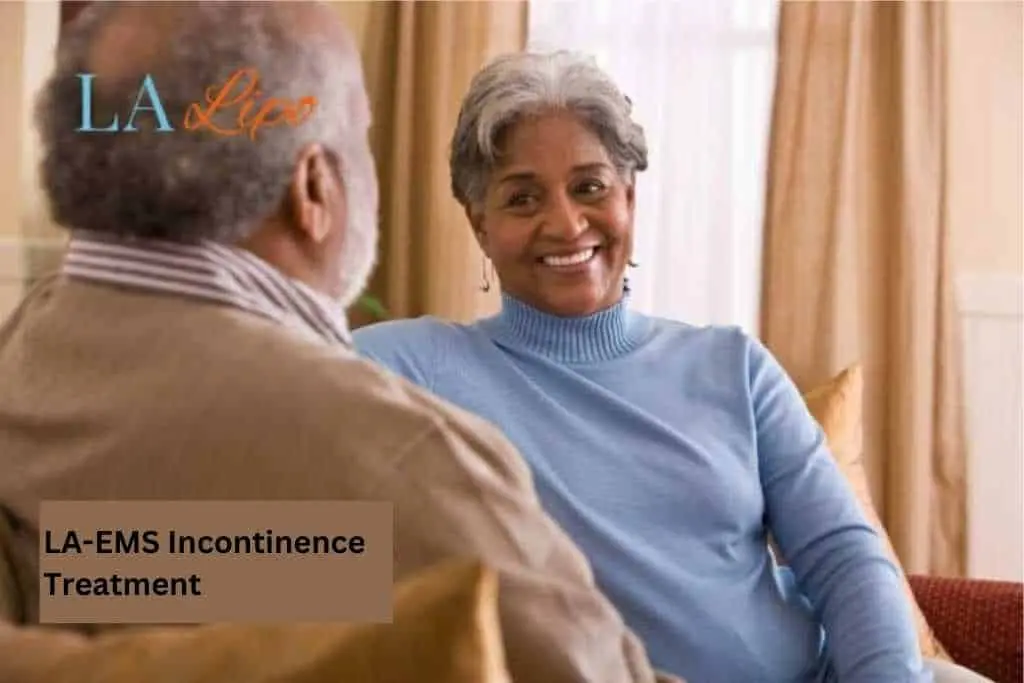 Couple sat smiling at each other - LA-EMS treatment Livingston