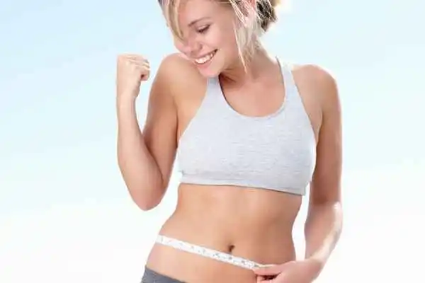 woman happy after fat reduction treatment Livingston
