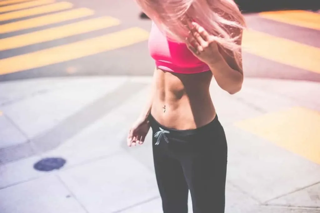 Woman with toned stomach after LA-EMS Body Sculpting Treatment Livingston